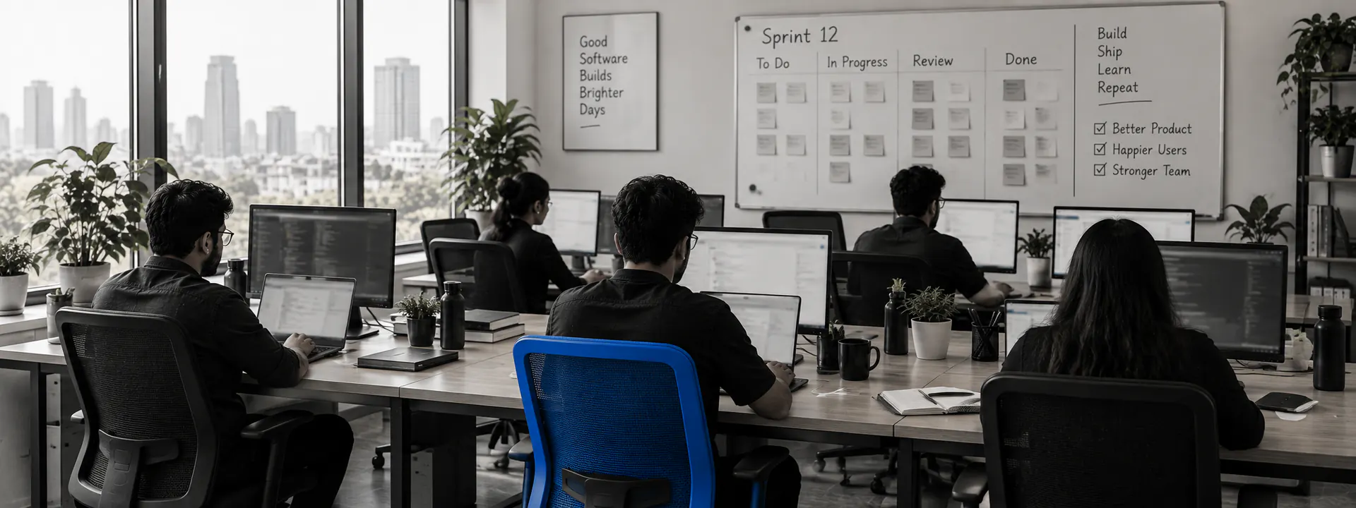 The QalbIT engineering team at work in the Ahmedabad office
